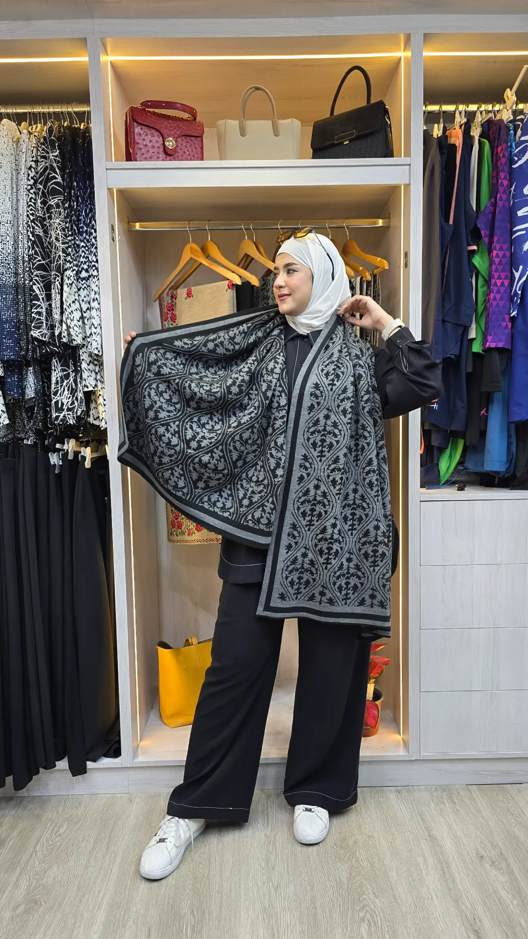 A stylish and distinctive knitted winter cape