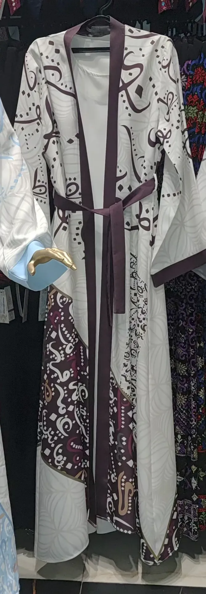 Ramadan abaya with Islamic calligraphy pattern